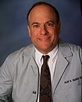 Dr. Alan D Gilman, MD