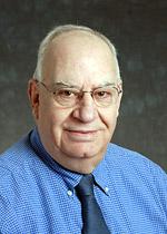 Dr. Michel E Kuzur, MD
