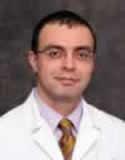 Dr. Ekrem Kutluay, MD